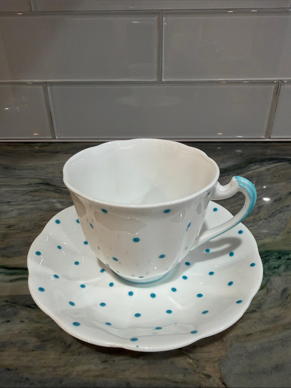 White Porcelain Teacup and Saucer Set with Turquoise Polka Dots